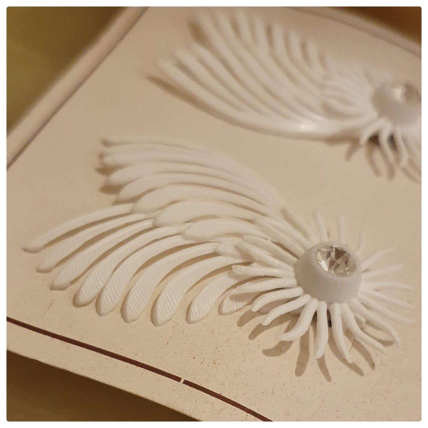 1960s UNWORN WHITE PLASTIC AND DIAMONTE EARRINGS