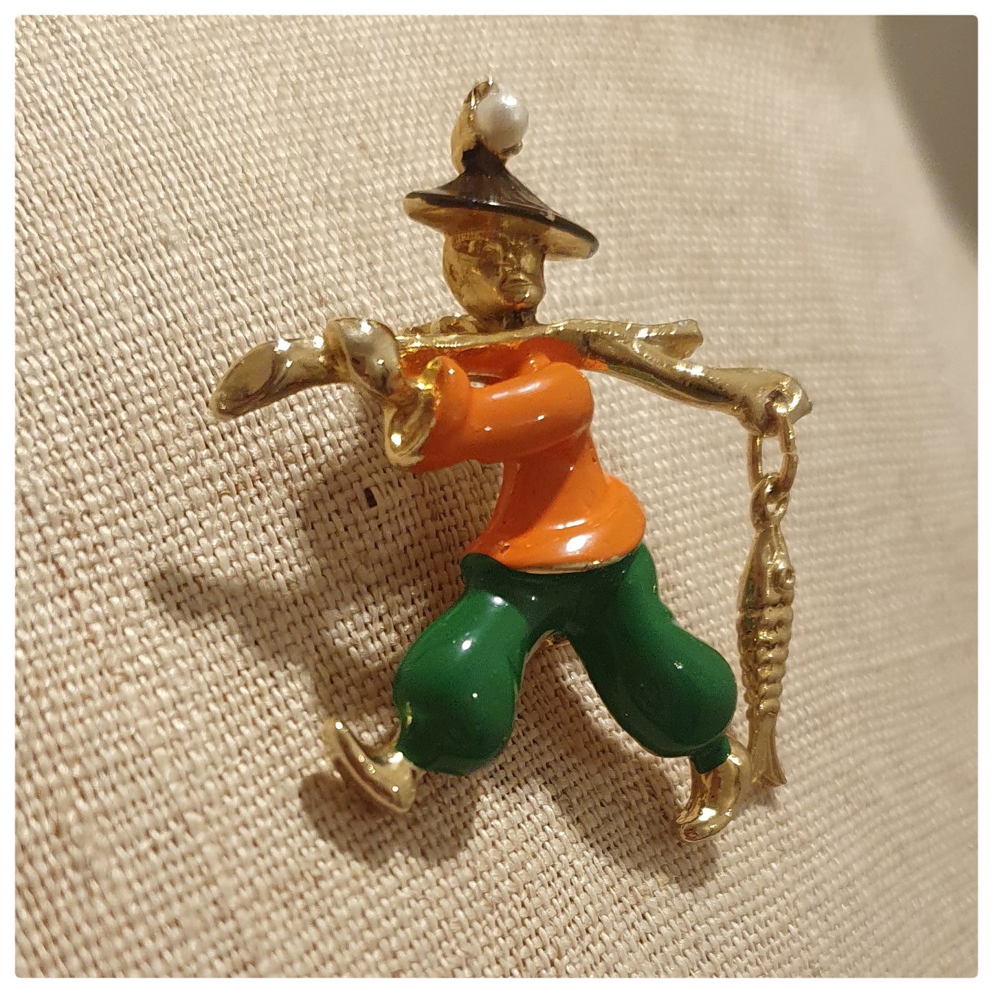 1950s ENAMEL ORIENTAL FISHERMAN BROOCH ORANGE AND GREEN