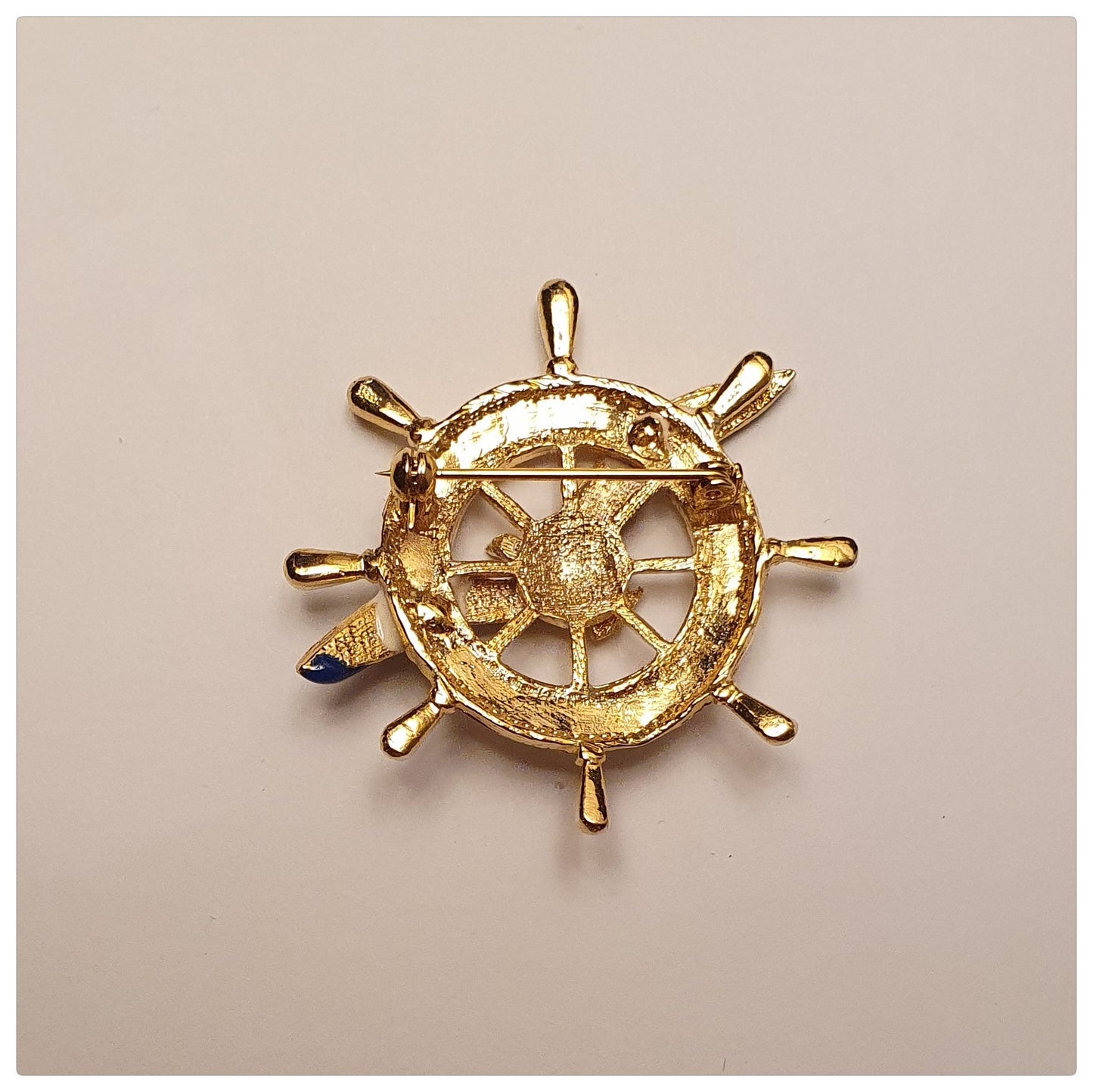 1980s ENAMEL WHITE SHIPS WHEEL AND BLUE SEAGULL