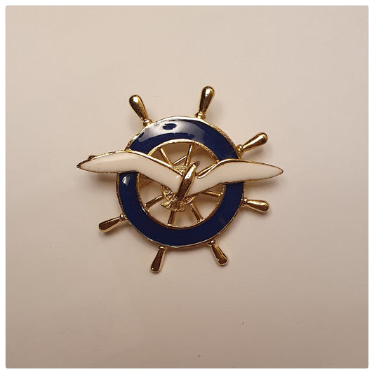 1980s ENAMEL WHITE SHIPS WHEEL AND BLUE SEAGULL