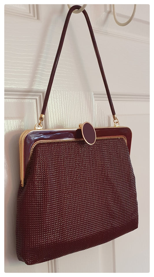 1982 GLOMESH BURGUNDY AND GOLD HANDBAG
